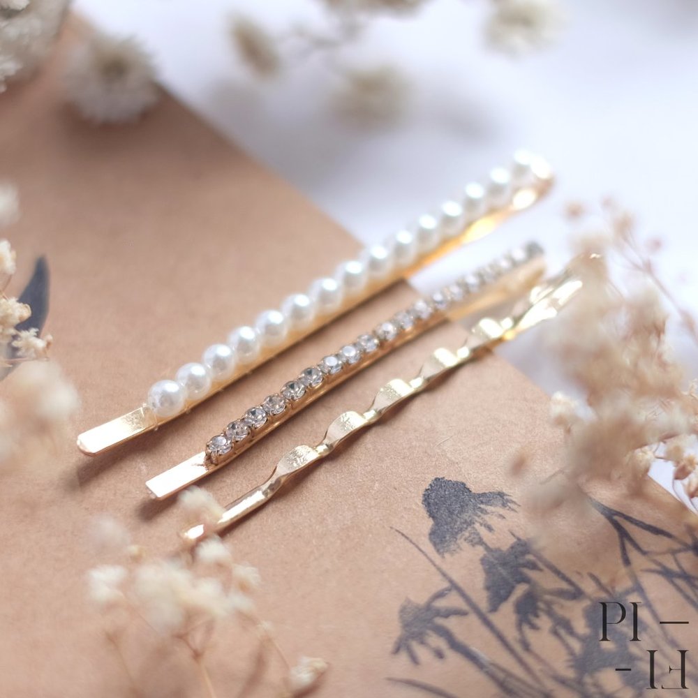 NWOT Set of three golden bobby pins never worn